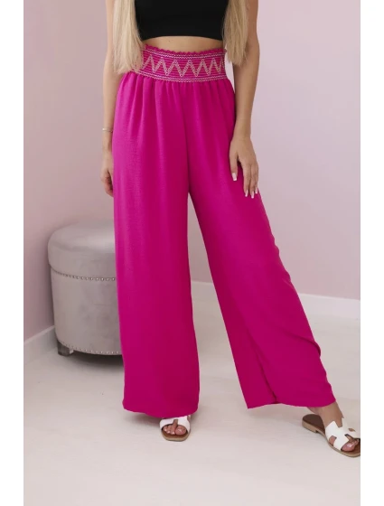 Nohavice so širokým elastickým pásom fuchsiovej farby