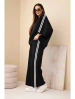 Dámsky viskózový komplet so širokými nohavicami a voľnou blúzkou čierny