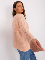 Broskyňový dámsky sveter s káblami