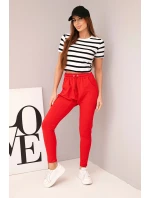 Dámske tepláky s elastickým pásom a šnúrkou na stiahnutie červené Dámske tepláky s elastickým pásom a šnúrkou na stiahnutie červené