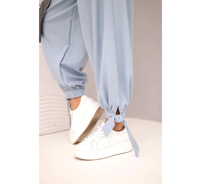 Dámske nohavice so širokými nohavicami a viazaním v spodnej časti džínsovo modré