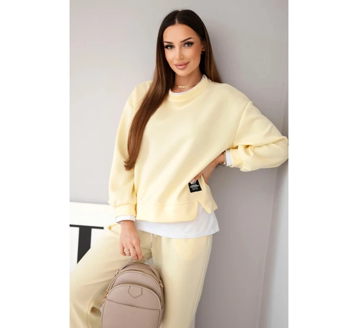 Dámská souprava s volná mikina a tepláky žlutý model 21808625 - K-Fashion Dámská souprava s volná mikina a tepláky žlutý model 21808625 - K-Fashion