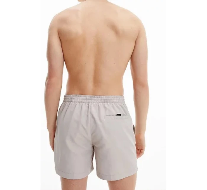Pánske kúpacie kraťasy - KM00718 ABM - béžová - Calvin Klein