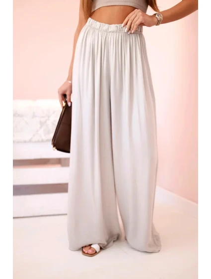 Dámske široké viskózové nohavice s elastickým pásom tmavo béžové Dámske široké viskózové nohavice s elastickým pásom tmavo béžové