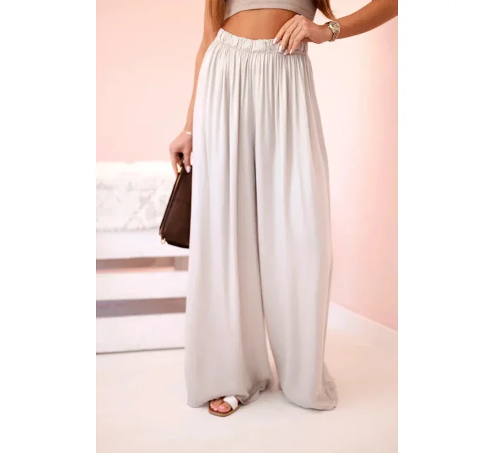 Dámske široké viskózové nohavice s elastickým pásom tmavo béžové Dámske široké viskózové nohavice s elastickým pásom tmavo béžové