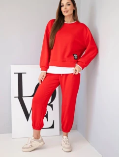 Dámska súprava maslovej farby s voľnou mikinou a teplákmi červená