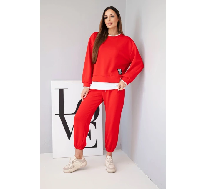 Dámska súprava maslovej farby s voľnou mikinou a teplákmi červená Dámska súprava maslovej farby s voľnou mikinou a teplákmi červená