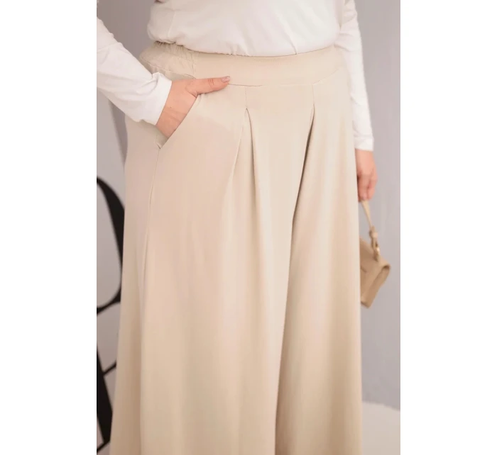 Dámské bavlněné kalhoty Plus Size s širokými nohavicemi a volným střihem béžové Dámské bavlněné kalhoty Plus Size s širokými nohavicemi a volným střihem béžové