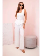 Dámsky overal bez rukávov so širokými nohavicami a ozdobnými gombíkmi ecru Dámsky overal bez rukávov so širokými nohavicami a ozdobnými gombíkmi ecru