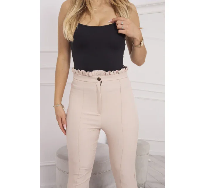 Béžové plisované nohavice