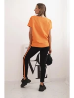 Dámska bavlnená súprava s tričkom a legínami s oranžovou šerpou Dámska bavlnená súprava s tričkom a legínami s oranžovou šerpou
