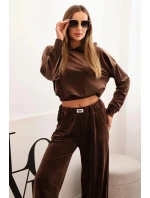 Dámska velúrová tepláková súprava so širokými nohavicami a kapucňou hnedá Dámska velúrová tepláková súprava so širokými nohavicami a kapucňou hnedá