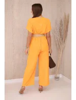 Kombinéza s ozdobným pásom oranžová