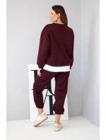 Dámska súprava s maslovou voľnou mikinou a teplákmi slivka Dámska súprava s maslovou voľnou mikinou a teplákmi slivka