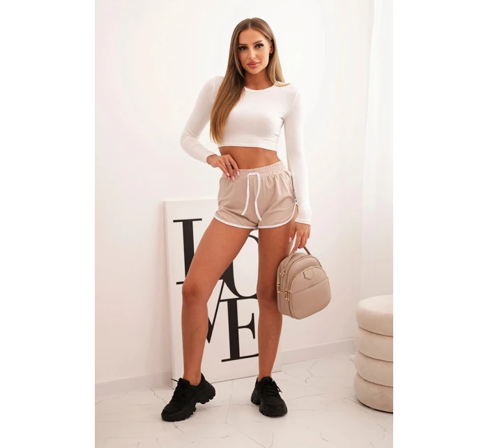 Dámské bavlněné šortky s elastickým pasem a model 21772744 lemem béžové - K-Fashion Dámské bavlněné šortky s elastickým pasem a model 21772744 lemem béžové - K-Fashion