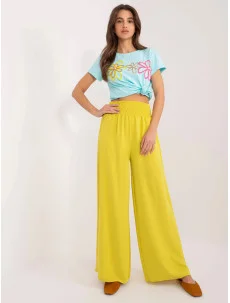Dámske nohavice so širokými nohavicami v elastickej žltej farbe (8390)