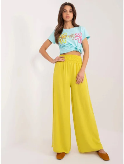 Dámske nohavice so širokými nohavicami v elastickej žltej farbe (8390)