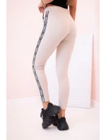 Dámske tepláky s opaskom a šnúrkou na stiahnutie béžové