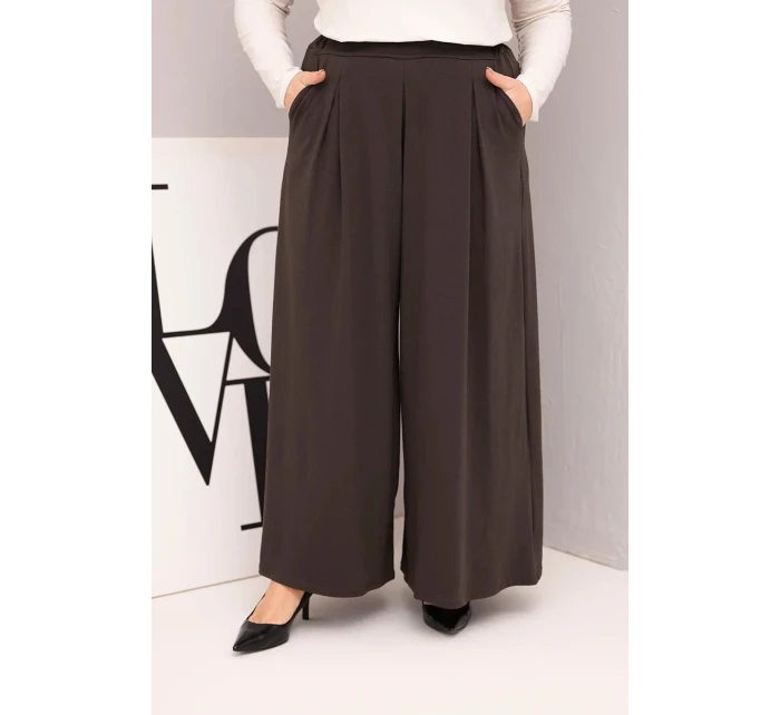 Dámské bavlněné kalhoty Plus Size s širokou nohavicí a volným střihem hnědé Dámské bavlněné kalhoty Plus Size s širokou nohavicí a volným střihem hnědé