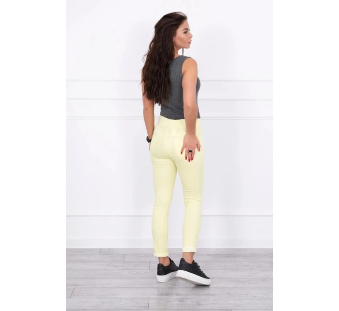 Nohavice v džínsovej žltej farbe