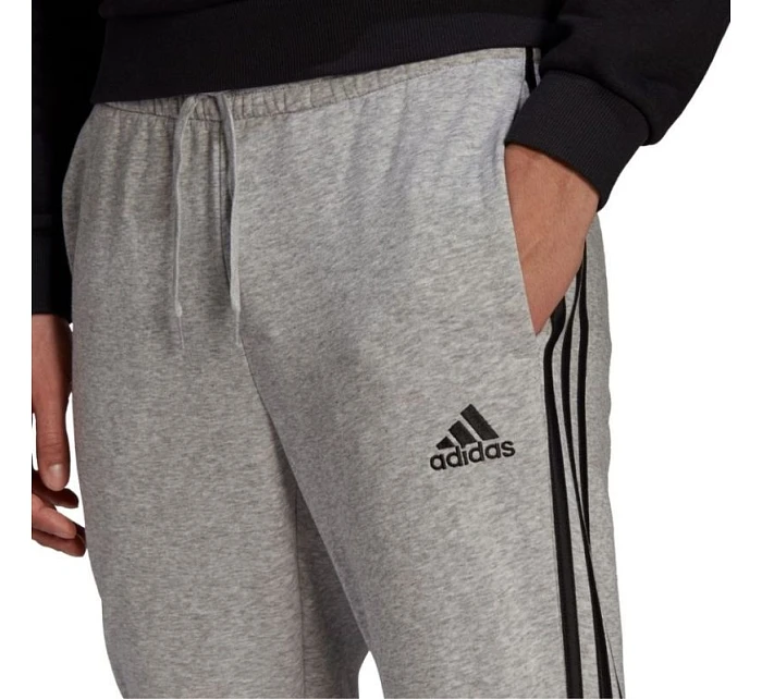 Pánské kalhoty Essentials Fleece M model 16053227 - ADIDAS