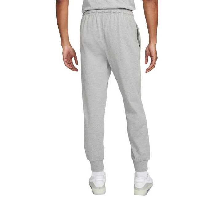 Pánske športové nohavice Nike Club Knit Jogger Grey FQ4330 063 Pánske športové nohavice Nike Club Knit Jogger Grey FQ4330 063