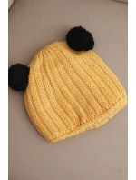 Dámská zimní čepice vlněná s bambulí model 21817789 žlutá - K-Fashion Dámská zimní čepice vlněná s bambulí model 21817789 žlutá - K-Fashion