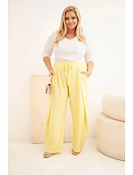 Dámské bavlněné kalhoty Plus Size s gumou v pase žluté Dámské bavlněné kalhoty Plus Size s gumou v pase žluté