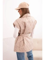 Dámska prešívaná vesta s opaskom a širokým golierom béžová