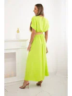 Dlhé šaty s ozdobným pásom neónovo zelenej farby