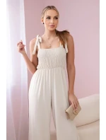 Kombinéza bez ramienok s volánom na vrchu béžová