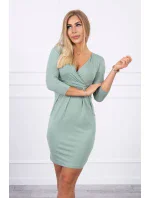 Priliehavé šaty s prestrihom pod prsiami tmavo mätovej farby