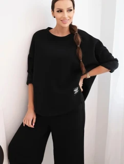 Dámska tepláková súprava z hrubšieho materiálu so širokými nohavicami čierna