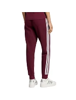 Dámske nohavice adidas Essentials 3-Stripes Fleece Slim v bordovej farbe KF8321 Dámske nohavice adidas Essentials 3-Stripes Fleece Slim v bordovej farbe KF8321