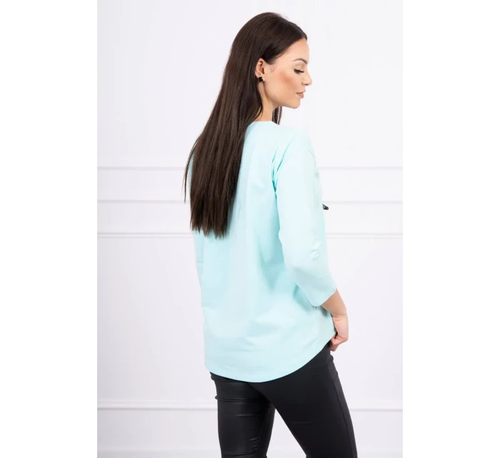 Pozoruhodná mätová blúzka s 3D grafikou