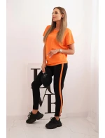 Dámska bavlnená súprava s tričkom a legínami s oranžovou šerpou Dámska bavlnená súprava s tričkom a legínami s oranžovou šerpou