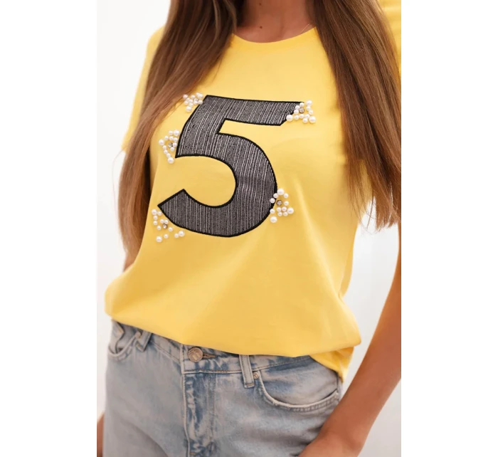 Dámska bavlnená blúzka s krátkym rukávom a perlovou aplikáciou žltá Dámska bavlnená blúzka s krátkym rukávom a perlovou aplikáciou žltá
