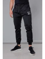 Černé pánské teplákové kalhoty s potiskem model 18347900 - J.STYLE Černé pánské teplákové kalhoty s potiskem model 18347900 - J.STYLE