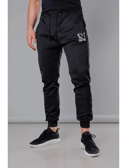 Černé pánské teplákové kalhoty s potiskem model 18347900 - J.STYLE Černé pánské teplákové kalhoty s potiskem model 18347900 - J.STYLE