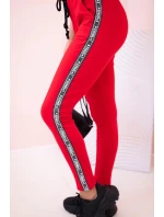 Dámske tepláky s opaskom a šnúrkou na stiahnutie červené