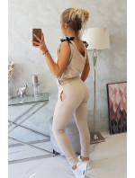 Nohavice/oblek s béžovým nápisom selfie