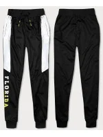 Černé pánské teplákové kalhoty model 18406712 - J.STYLE Černé pánské teplákové kalhoty model 18406712 - J.STYLE