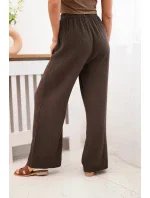 Mušelínové nohavice so širokými nohavicami hnedej farby