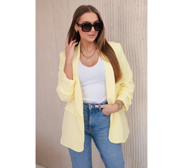 Bunda s klopami elegantná žltá Bunda s klopami elegantná žltá