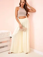 Dámske široké viskózové nohavice s elastickým pásom žlté