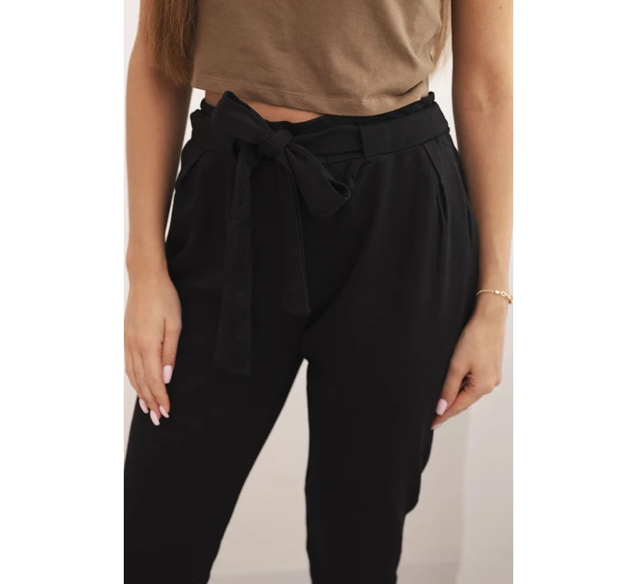 Dámske bavlnené nohavice so zaväzovaním v páse a zúženými nohavicami čierne Dámske bavlnené nohavice so zaväzovaním v páse a zúženými nohavicami čierne