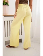 Mušelínové nohavice so širokými nohavicami žltej farby