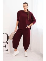 Dámska tepláková súprava z hrubšieho materiálu so širokými nohavicami bordová Dámska tepláková súprava z hrubšieho materiálu so širokými nohavicami bordová