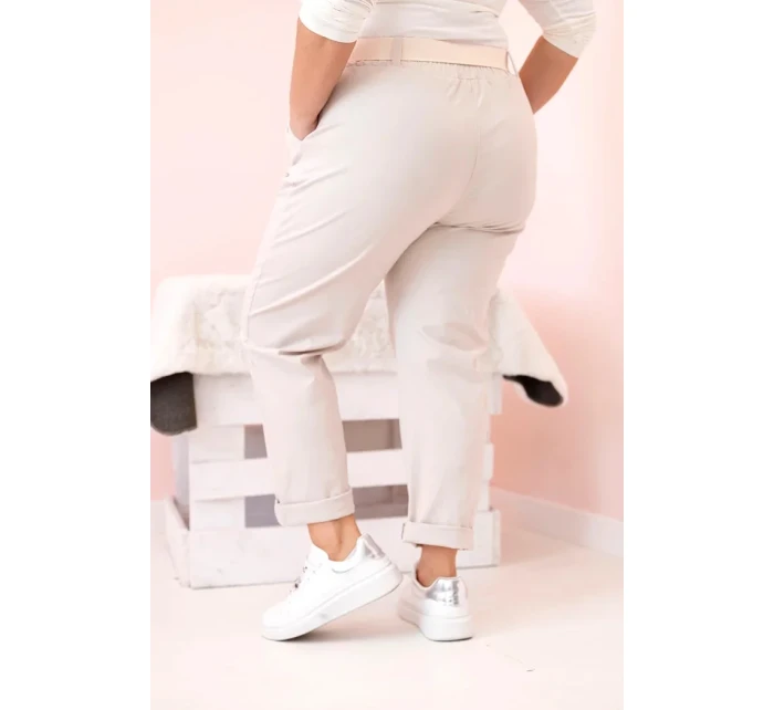 Dámske bavlnené nohavice s opaskom v béžovej farbe