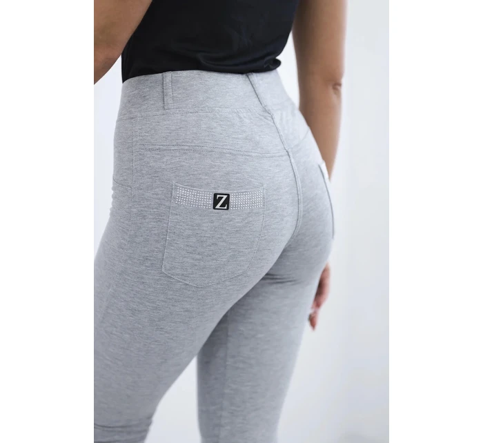 Bavlnené nohavice so zirkónmi na zadných vreckách sivé Bavlnené nohavice so zirkónmi na zadných vreckách sivé